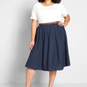ModCloth tiger lily navy blue midi skirt with pockets.